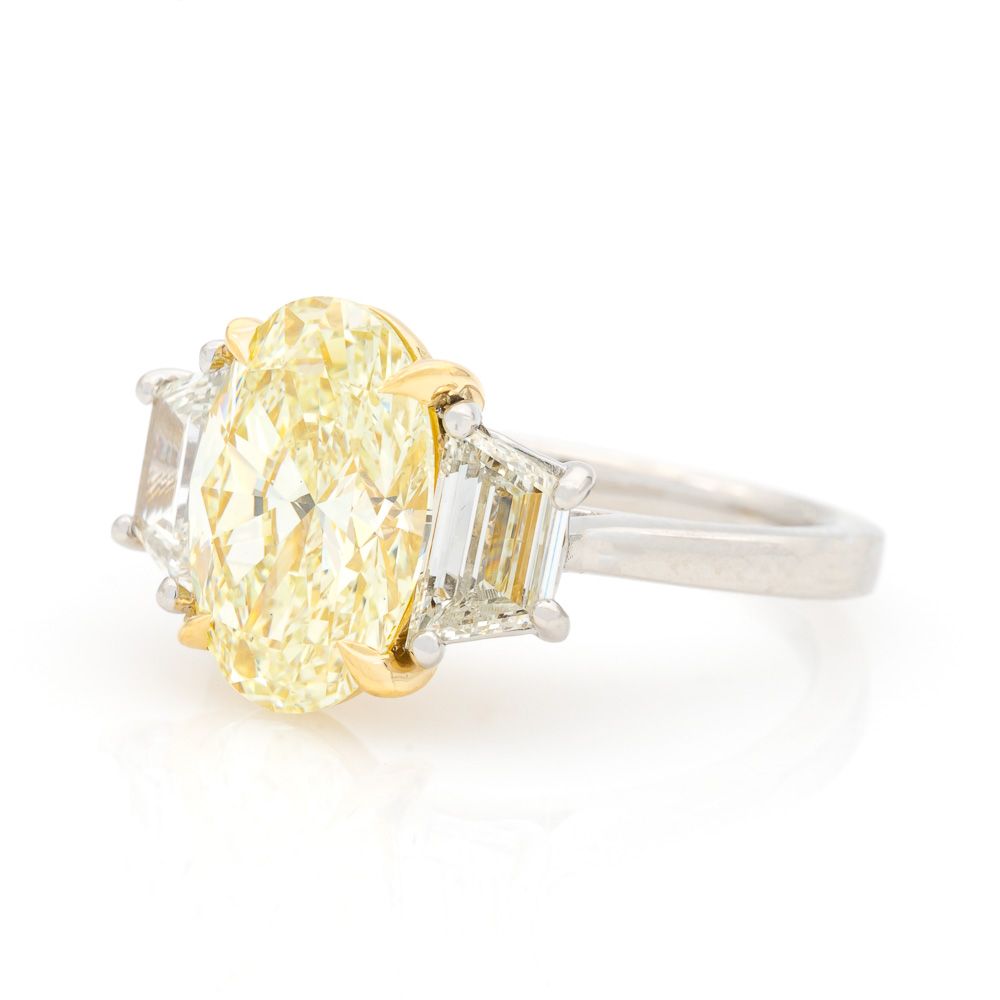 Platinum and 18K Yellow Gold Three Stone Yellow Diamond and Trapezoid Diamond Ring - Diamond Fashion Rings