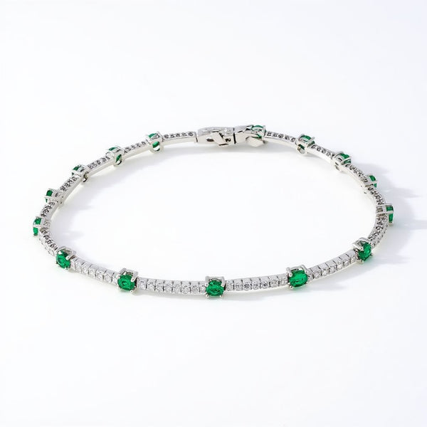 18k 2.95ctw Emerald and Diamond Halo Bracelet