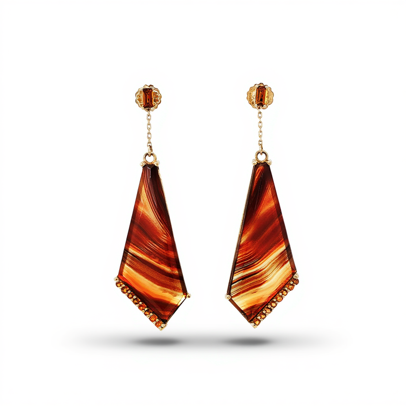 Geometric shield shaped dangle earrings featuring polished brown striated agate panels accented by orange citrine gemstones crafted by a custom jewelry creator