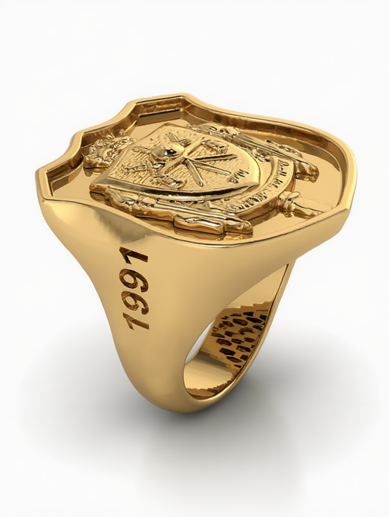 A heavy custom jewelry creator yellow gold signet ring featuring an engraved institutional shield crest and the commemorative year 1991 on the side