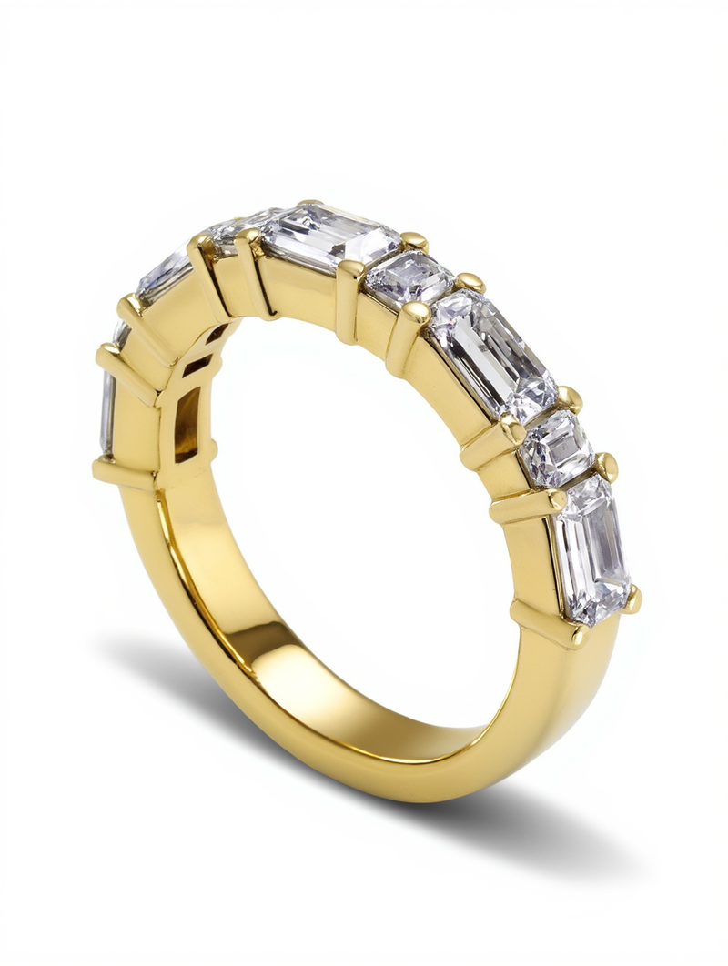 A thick platinum anniversary ring featuring three rows of brilliant round diamonds in a dense pave setting by a custom jewelry creator