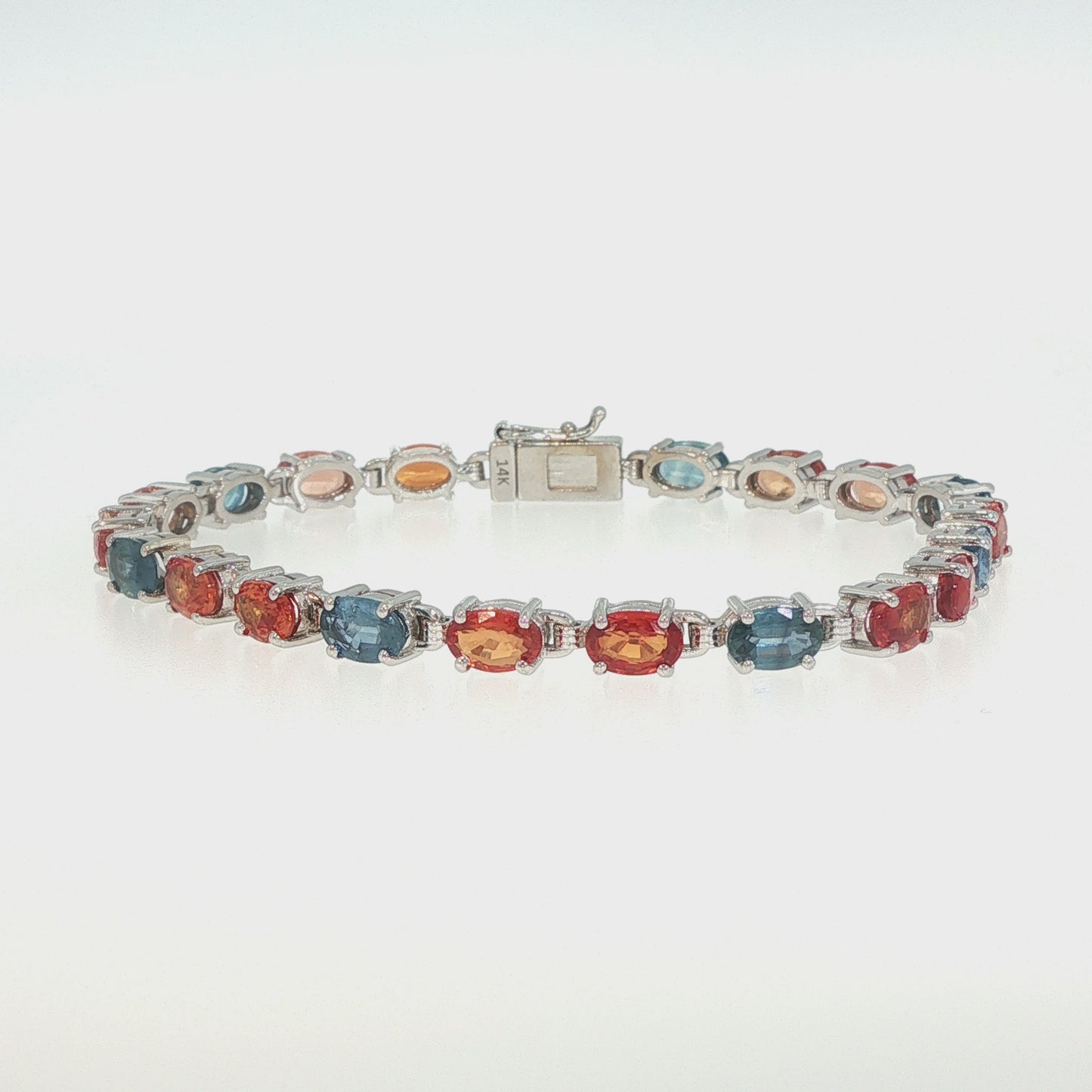 House of Kimball's 14k 14ctw Blue and Orange Sapphire Bracelet